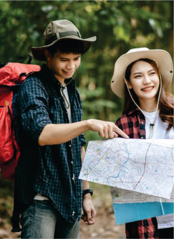 young girl and man with a backpack and trekking hat on affordable Masai Mara and Lake Nakuru safari tour