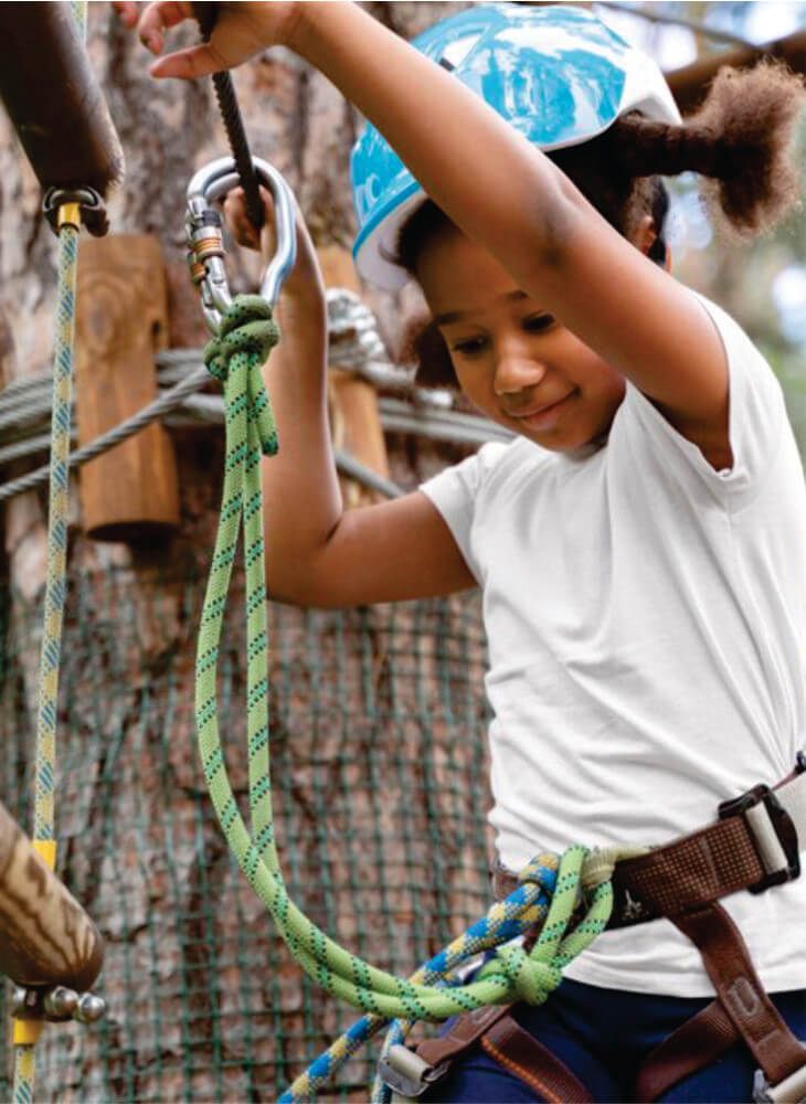 Courageous kid playing and having fun at an adventure park in Kenya on an affordable Kenya adventure safari tour