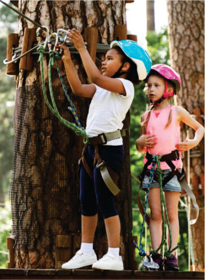 two courageous kids playing and having fun at an adventure park in Kenya on an affordable Kenya adventure safari tour